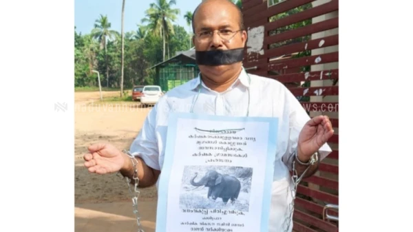  ചക്കിട്ടപാറ കർഷക ഗ്രാമസഭയിൽ   ചങ്ങല ബന്ധിച്ച്  പ്രതിഷേധം നടത്തി കർഷകൻ 