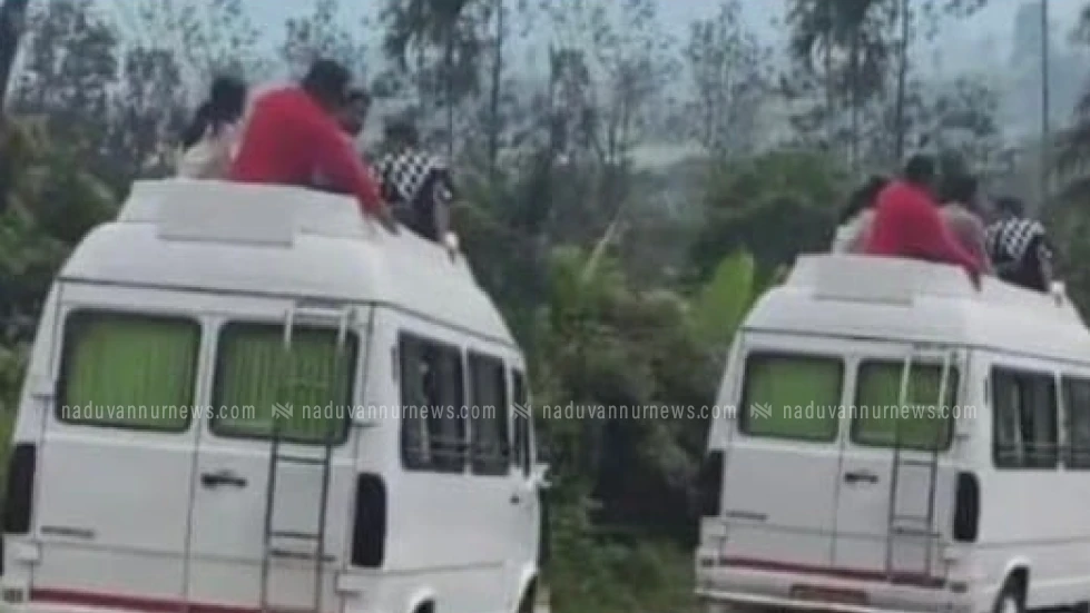 ട്രാവലറിന്റെ മുകളിൽ കയറി ചൂരൽ മലയിലേക്ക് വിനോദസഞ്ചാരികളുടെ അപകട യാത്ര