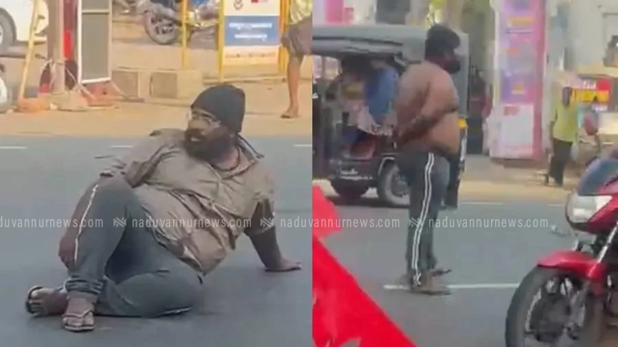  നഗരമധ്യത്തിൽ യുവാവിന്റെ പരാക്രമം. റോഡിലിരുന്ന് വാഹനം തടയലും അസഭ്യം പറച്ചിലും